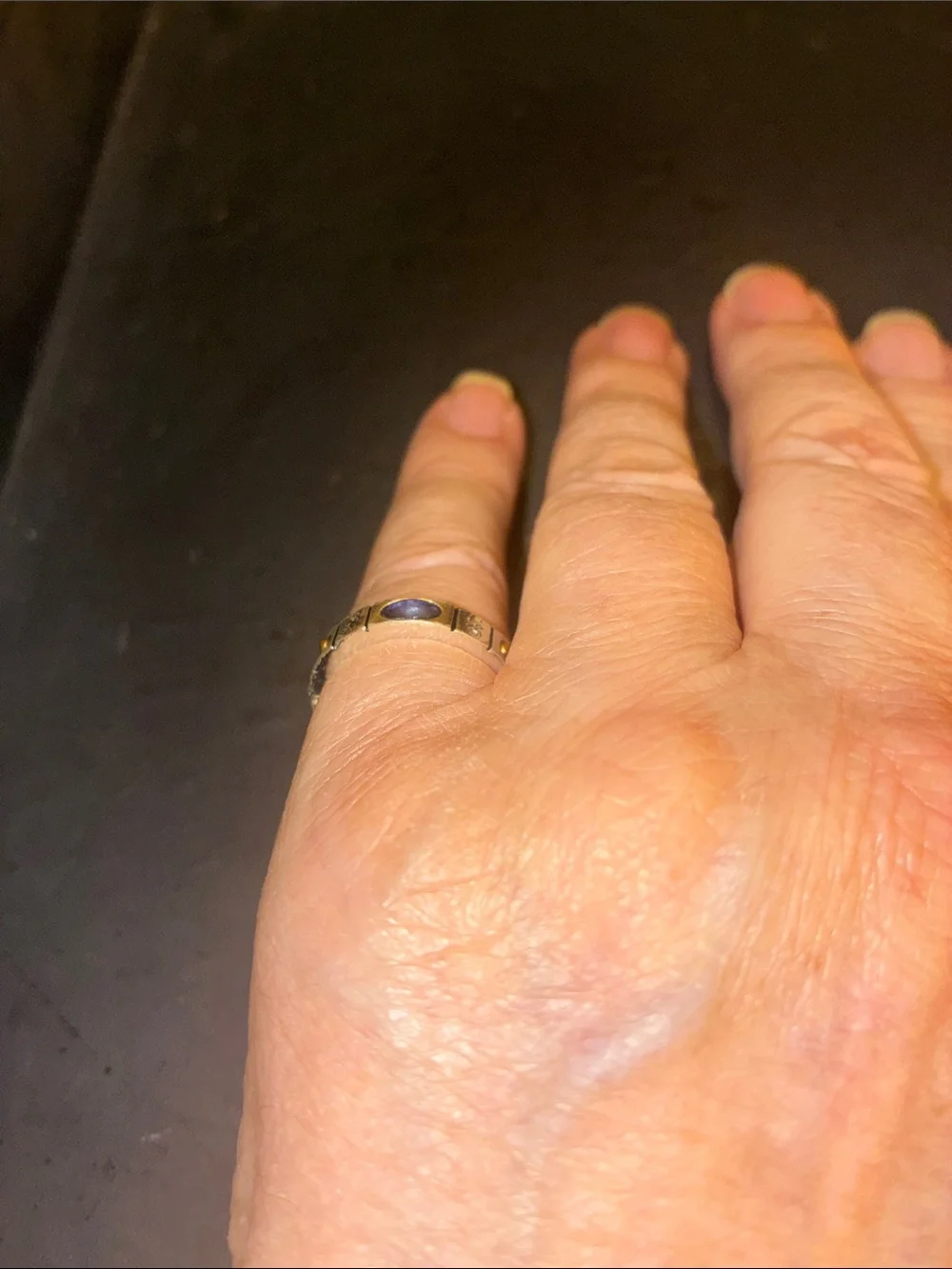 Gold-Tone Stretch Ring with Blue Cabochon Oval Stone